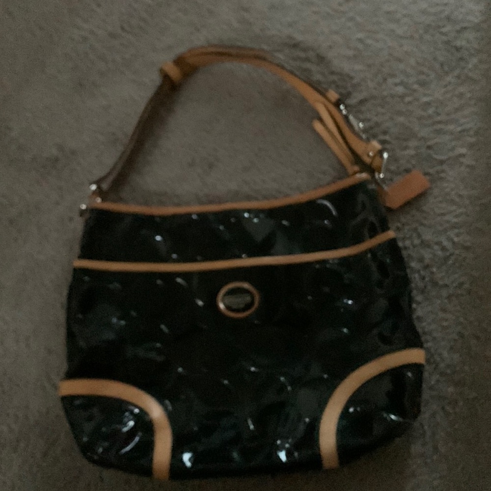 Coach patent leather shoulder bag.